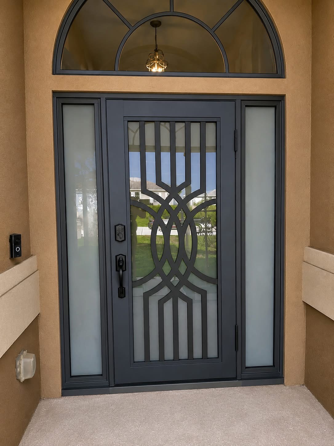 Gray double entry door with geometric glass panels