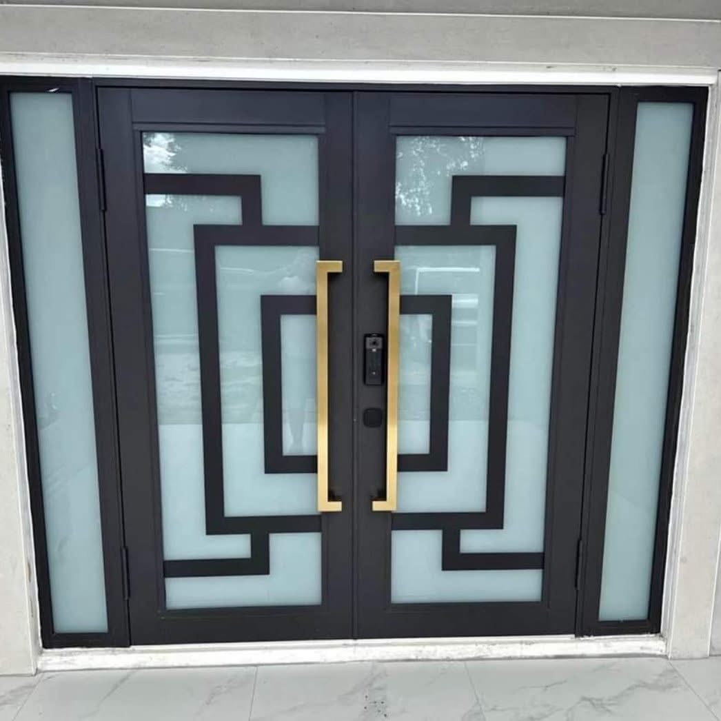 Black double door with brass handles and sidelights